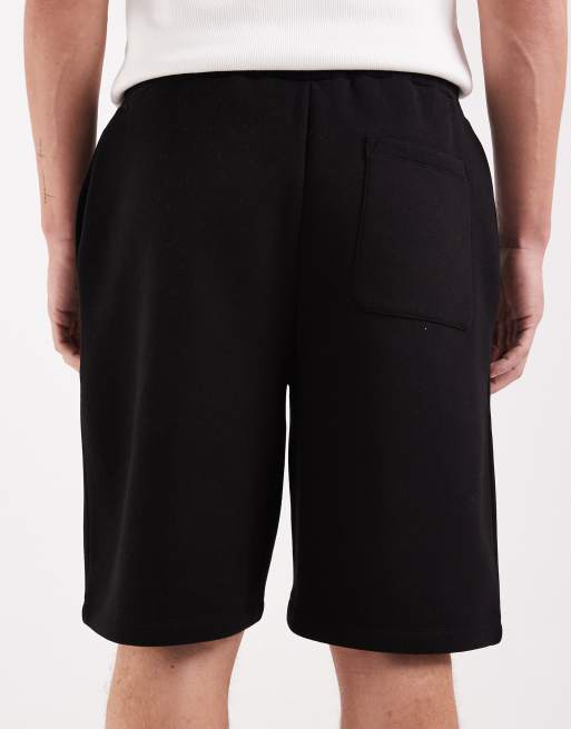 ASOS DESIGN - Pantalones cortos negros sueltos de punto liso, 5 de 5
