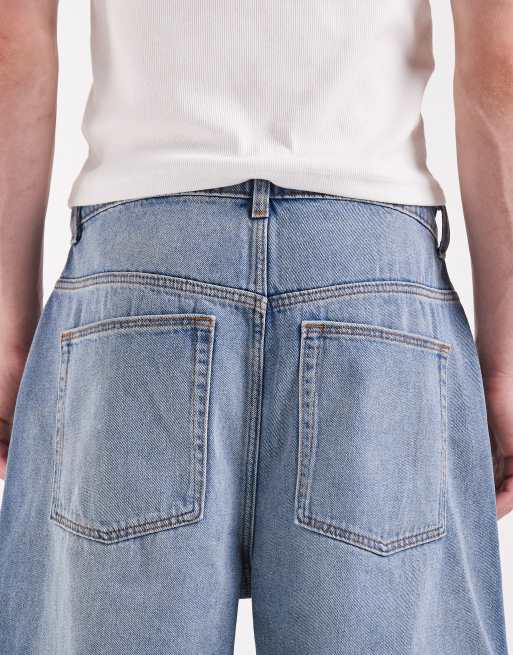 ASOS DESIGN - Pantalones cortos vaqueros azules de corte alargado suelto con lavado claro , 6 de 6