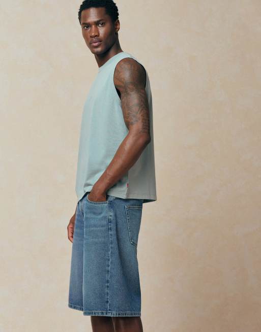 ASOS DESIGN - Pantalones cortos vaqueros azules de corte alargado suelto con lavado medio , 2 de 5