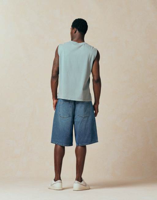 ASOS DESIGN - Pantalones cortos vaqueros azules de corte alargado suelto con lavado medio , 3 de 5