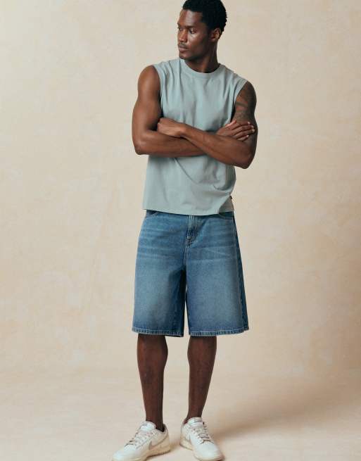 ASOS DESIGN - Pantalones cortos vaqueros azules de corte alargado suelto con lavado medio , 5 de 5