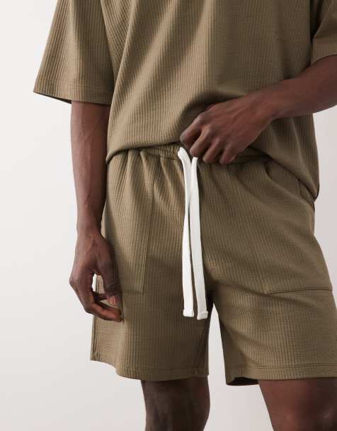 ASOS DESIGN - Pantalones cortos verde negruzco extragrandes de sirsaca de punto liso - view 1