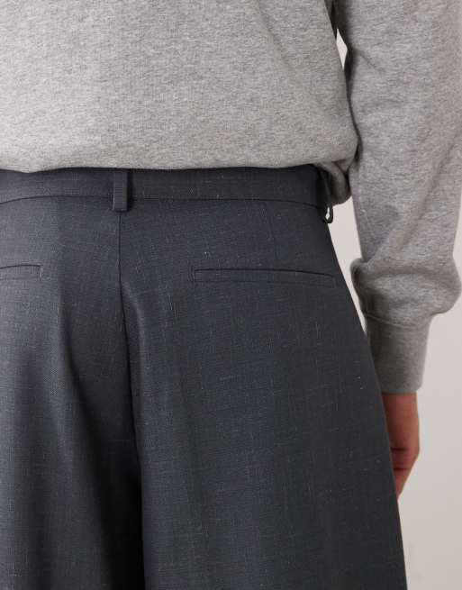ASOS DESIGN - Pantalones de sastre azul oscuro de corte barrel ancho de tejido efecto denim con cinturón, 4 de 5