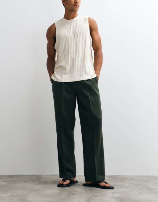 ASOS DESIGN pantalones de sastre plisados de pernera ancha en verde oscuro, 3 de 5