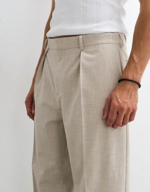 ASOS DESIGN pantalones de sastre plisados extragrandes de pernera cónica con vueltas en crudo, 3 de 9