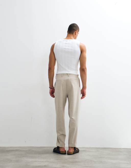 ASOS DESIGN pantalones de sastre plisados extragrandes de pernera cónica con vueltas en crudo, 4 de 9