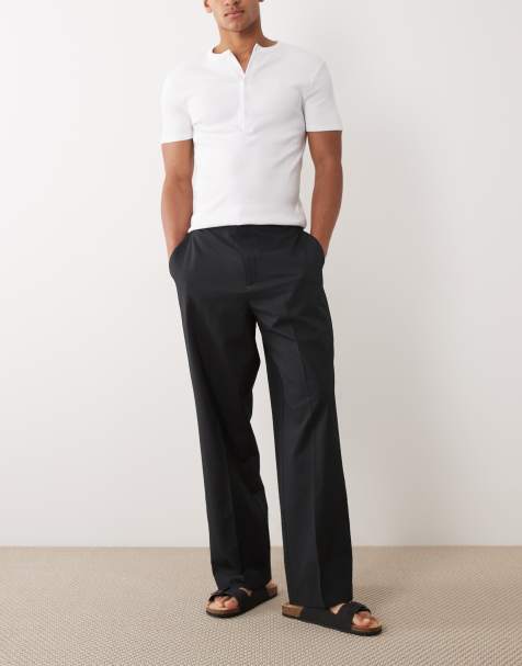 ASOS DESIGN - Pantalones de vestir negros de pernera ancha con cintura elástica de sirsaca - view 1