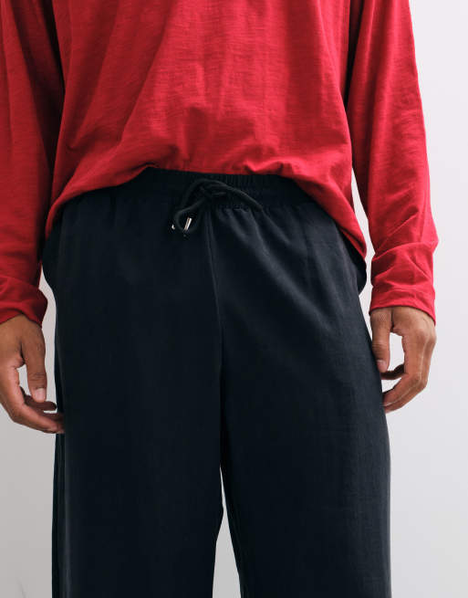 ASOS DESIGN pantalones fluidos de pernera ancha de conjunto en negro, 3 de 5
