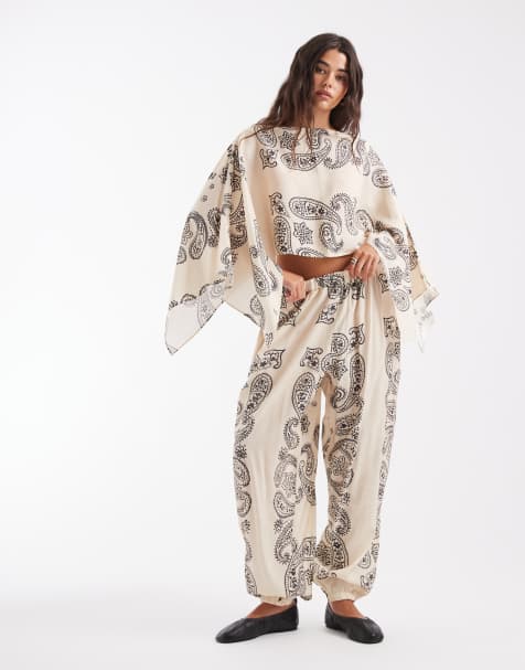 ASOS DESIGN - Pantalones marrones de corte globo con estampado de cachemir (parte de un conjunto) - view 1