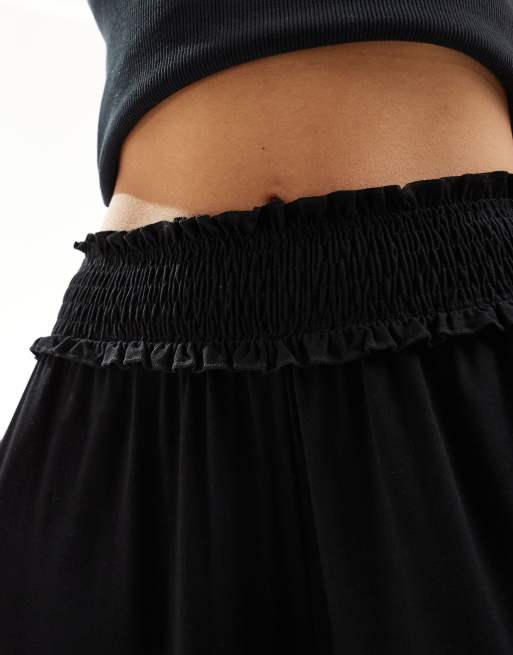 ASOS DESIGN - Pantaloni a fondo ampio neri con vita arricciata, 2 di 5