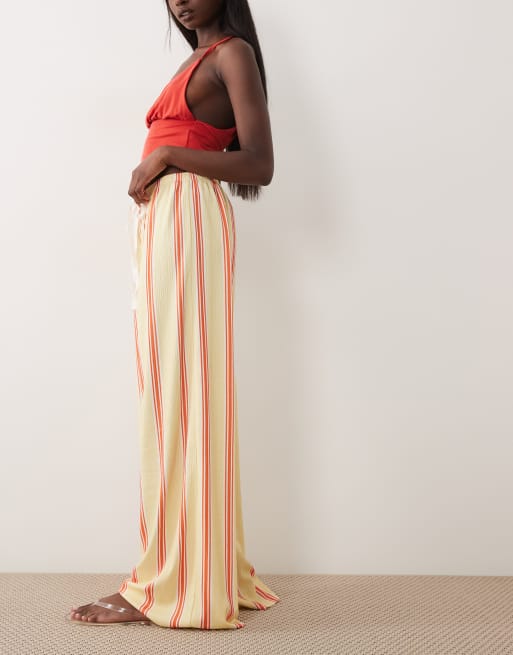 ASOS DESIGN - Pantaloni a fondo ampio testurizzati con coulisse e stampa gialla a righe, 2 di 5