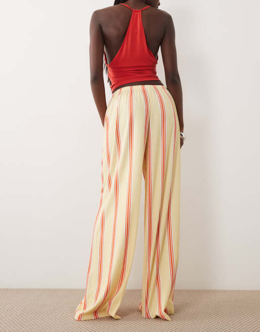 ASOS DESIGN - Pantaloni a fondo ampio testurizzati con coulisse e stampa gialla a righe, 5 di 5