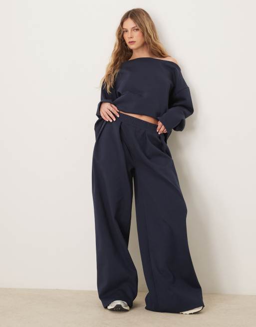 ASOS DESIGN - Pantaloni a fondo super ampio in tessuto interlock color blu navy in coordinato