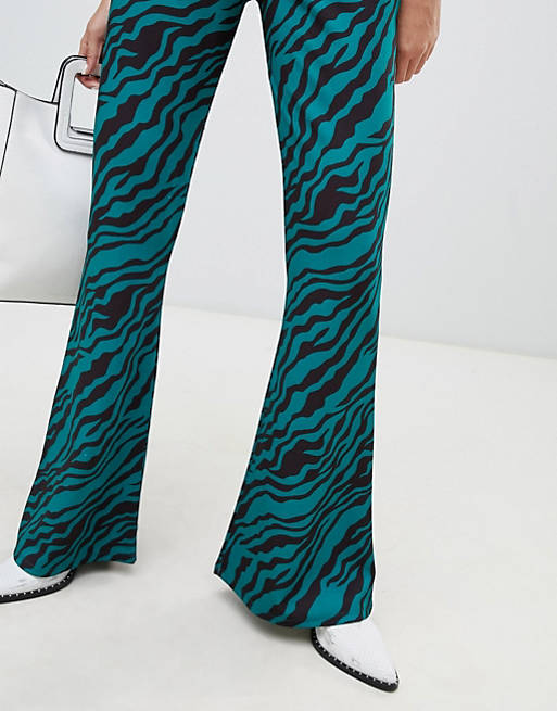 Asos Donna Abbigliamento Pantaloni e jeans Pantaloni Leggings & Treggings Pantaloni elasticizzati a zampa con stampa zebrata 