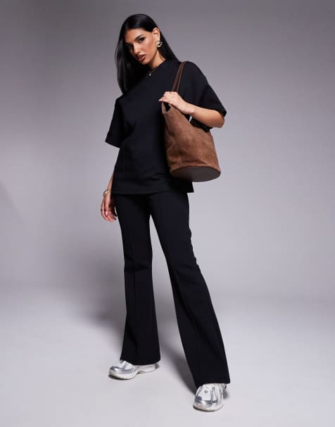 ASOS DESIGN - Pantaloni a zampa skinny in interlock neri con cuciture in coordinato - view 1