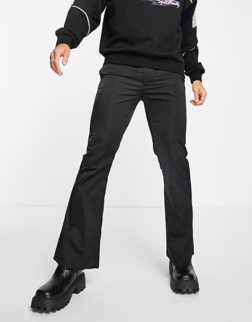 ASOS DESIGN - Pantaloni a zampa tecnici neri in nylon