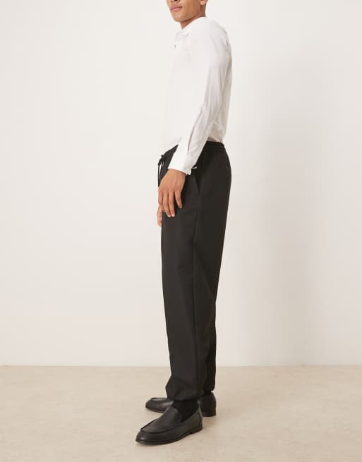 ASOS DESIGN - Pantaloni affusolati neri con fascia in vita e fondo elasticizzati, 3 di 5