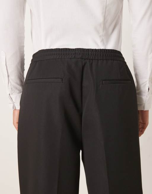 ASOS DESIGN - Pantaloni affusolati neri con fascia in vita e fondo elasticizzati, 5 di 5