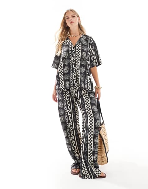 ASOS DESIGN - Pantaloni ampi con stampa di conchiglie in bianco e nero - view 1