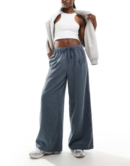 ASOS DESIGN - Pantaloni blu a fondo ampio in tessuto a coste 