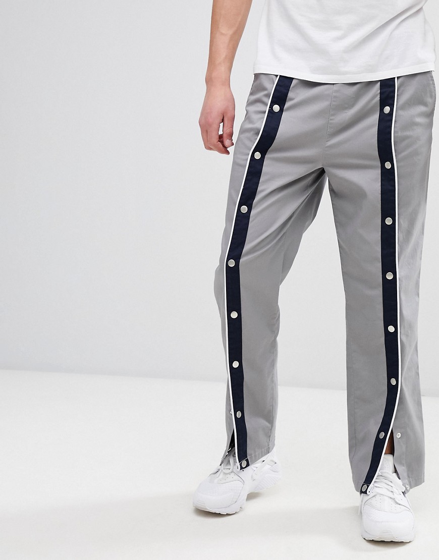 ASOS DESIGN - Pantaloni comodi grigi con bottoni a pressione sul davanti-Grigio