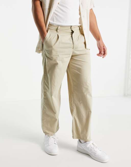 ASOS DESIGN - Pantaloni con fondo ampio leggeri a pieghe, colore beige