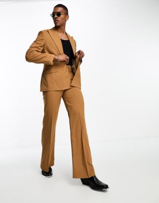 ASOS DESIGN - Pantaloni da abito a zampa color tabacco con tasche sul davanti