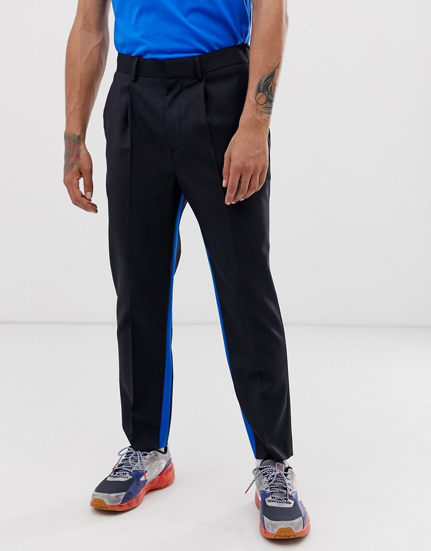 ASOS DESIGN - Pantaloni da abito affusolati blu navy con righe laterali