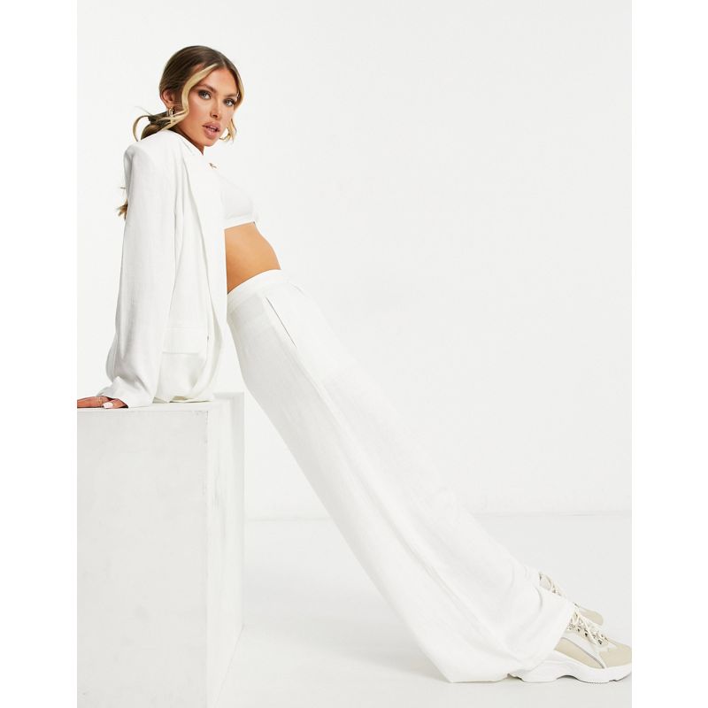 Donna Abiti e Spezzati DESIGN - Pantaloni da abito con fondo ampio in lino bianco slavato