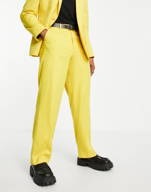 ASOS DESIGN - Pantaloni da abito gialli con fondo ampio 