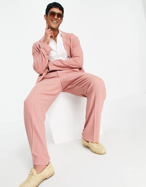 ASOS DESIGN - Pantaloni da abito morbidi a fondo ampio con taglio sartoriale in crêpe rosa pastello
