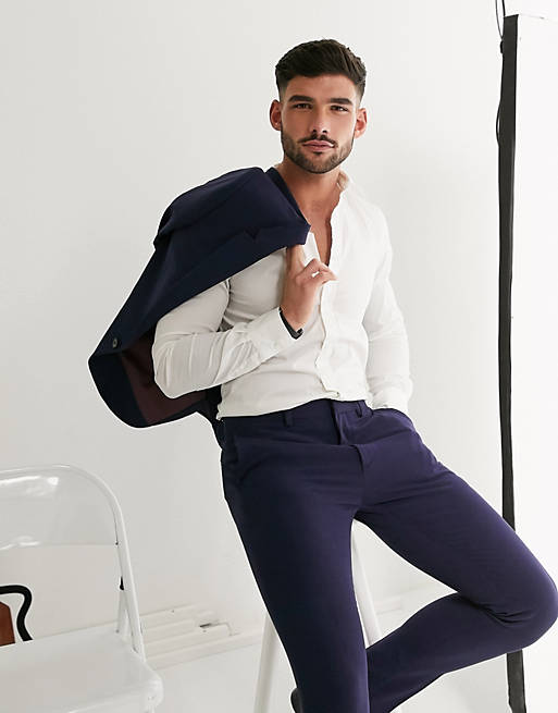 ASOS DESIGN - Pantaloni da abito super skinny elasticizzati in quattro direzioni blu navy
