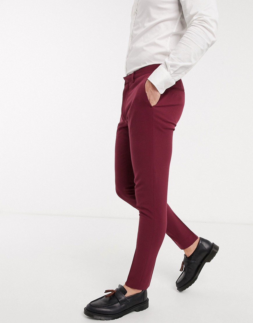ASOS DESIGN - Pantaloni da abito super skinny elasticizzati in quattro direzioni bordeaux-Rosso