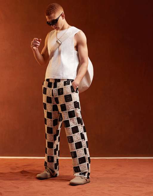 ASOS DESIGN - Pantaloni da spiaggia premium all'uncinetto bianchi e neri testurizzati con vita elasticizzata, 5 di 5