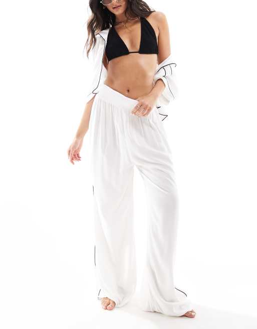 ASOS DESIGN - Pantaloni da spiaggia sinuosi morbidissimi a fondo ampio bianchi con profili a contrasto