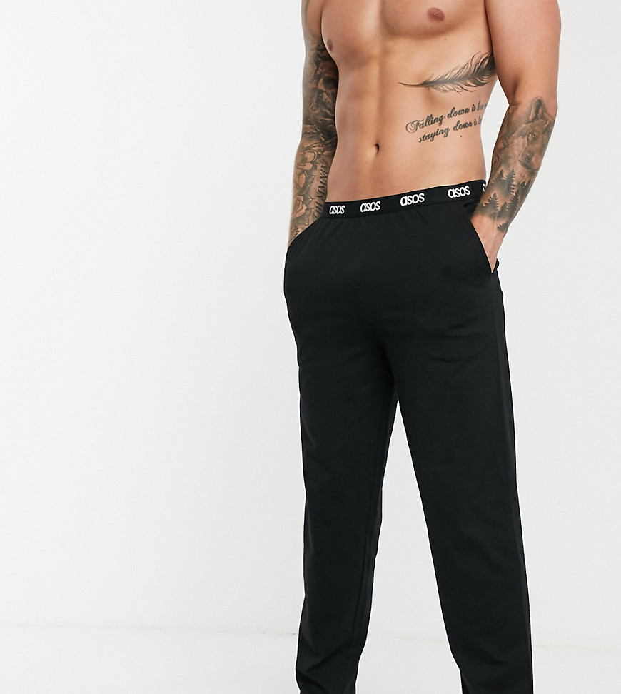 ASOS DESIGN - Pantaloni del pigiama comodi neri con fascia in vita con logo-Nero
