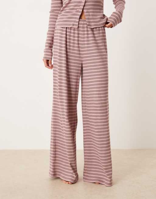 ASOS DESIGN - Pantaloni del pigiama con fondo ampio rosa e marroni a righe a coste, 2 di 4