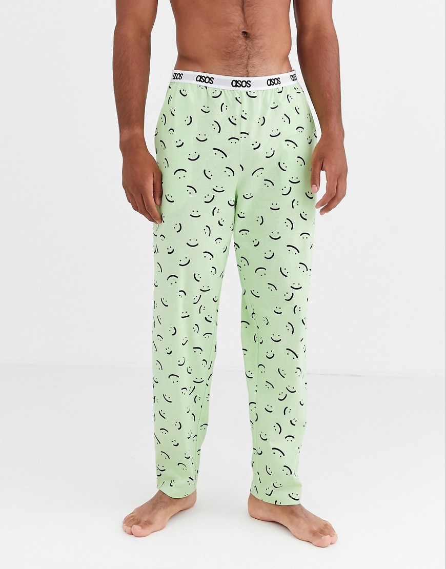 ASOS DESIGN - Pantaloni del pigiama con stampa di volti verdi-Multicolore
