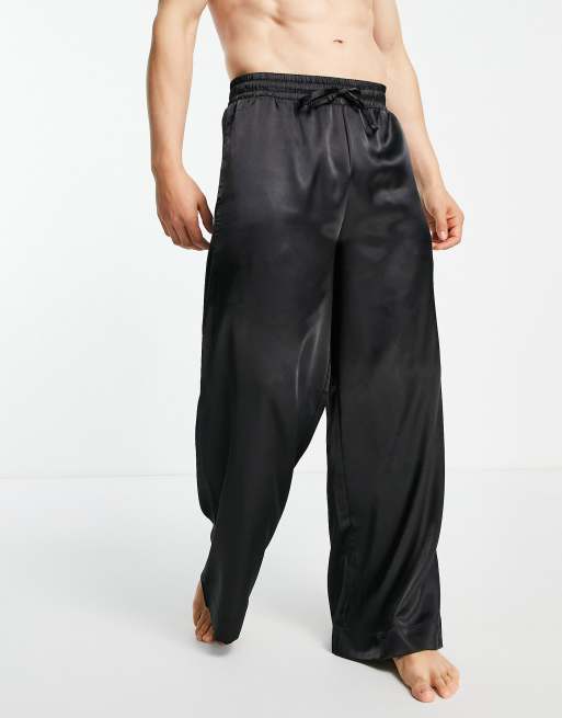 ASOS DESIGN - Pantaloni del pigiama da casa con fondo ampio, colore nero Satin