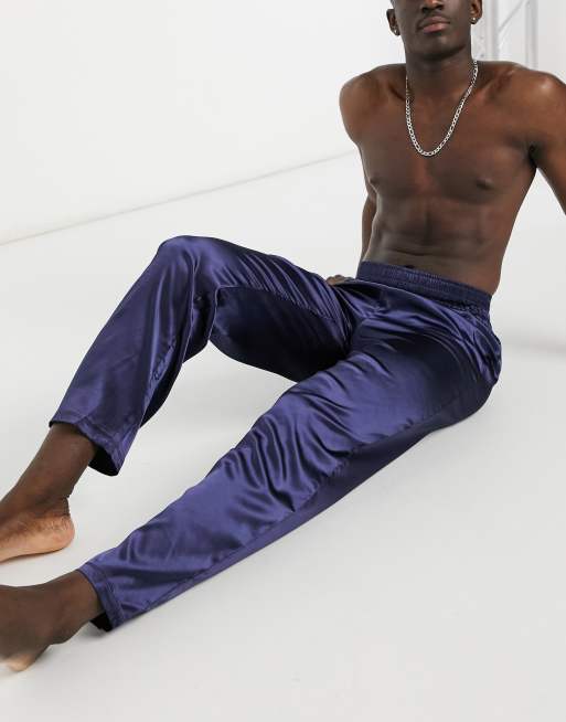 ASOS DESIGN - Pantaloni del pigiama in raso blu navy con elastico in vita alto