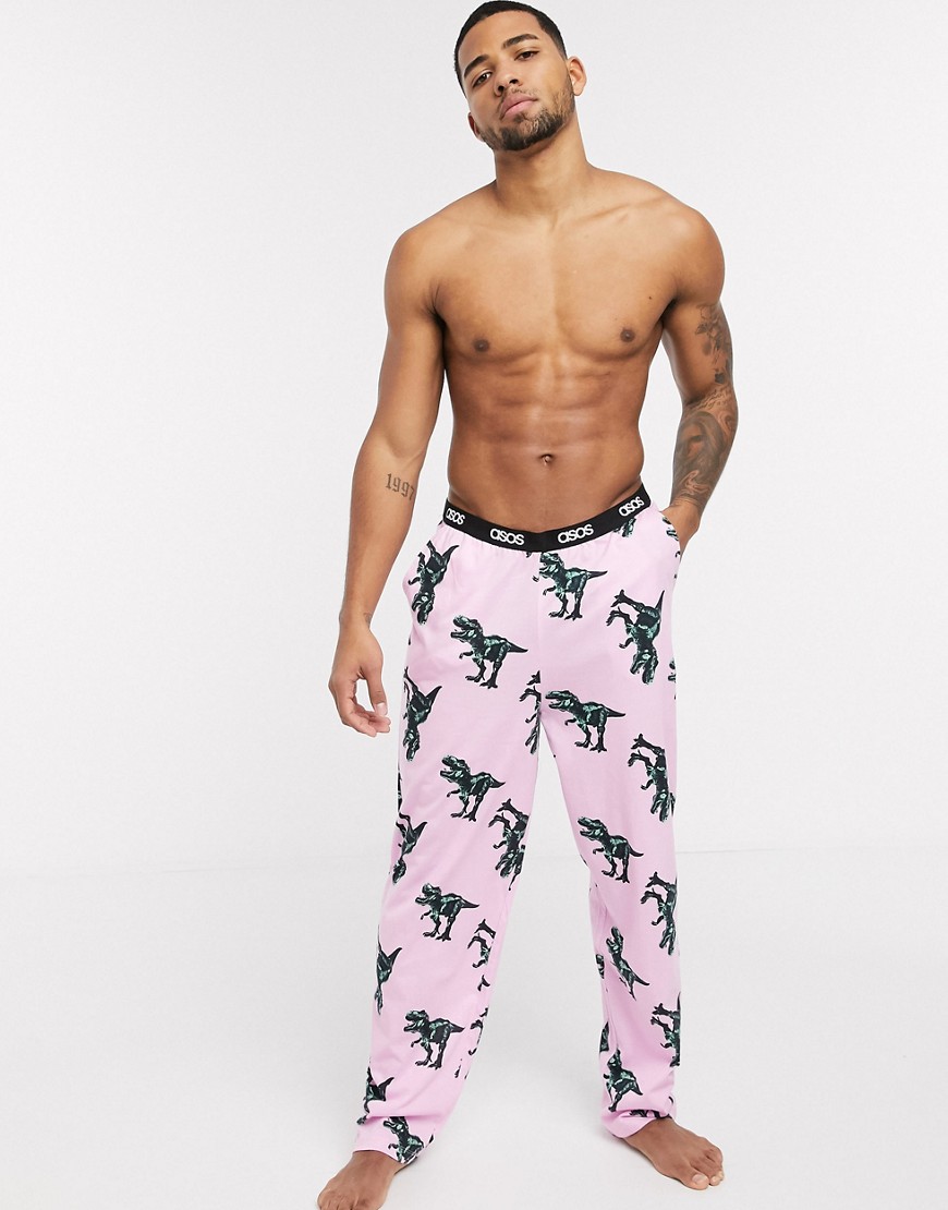 ASOS DESIGN - Pantaloni del pigiama rosa con originale stampa di dinosauri