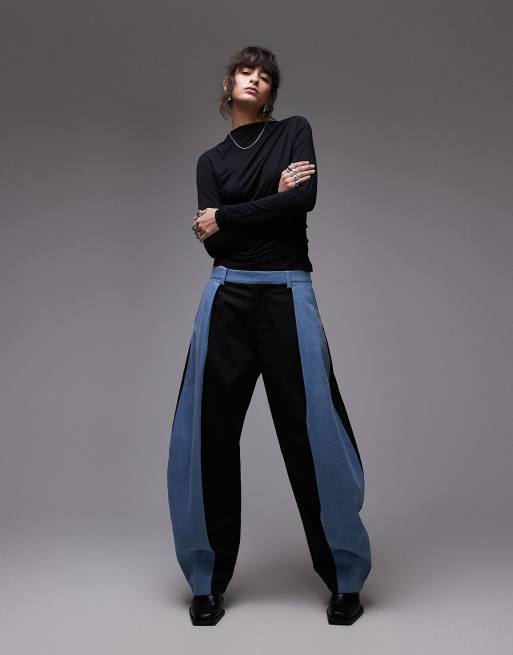 ASOS DESIGN - Pantaloni destrutturati neri con dettagli in denim a contrasto