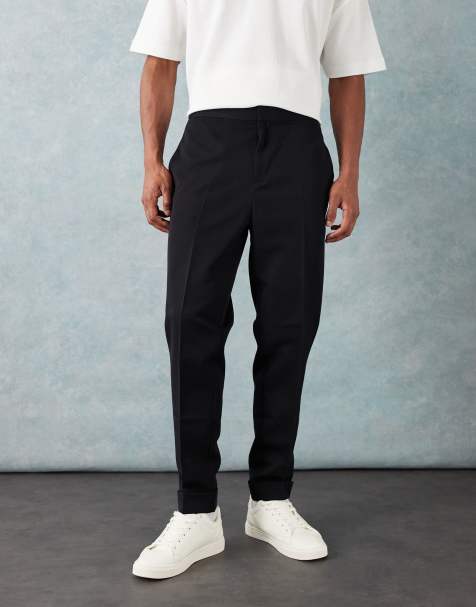 ASOS DESIGN - Pantaloni eleganti affusolati neri con risvolti e vita elasticizzata - view 1