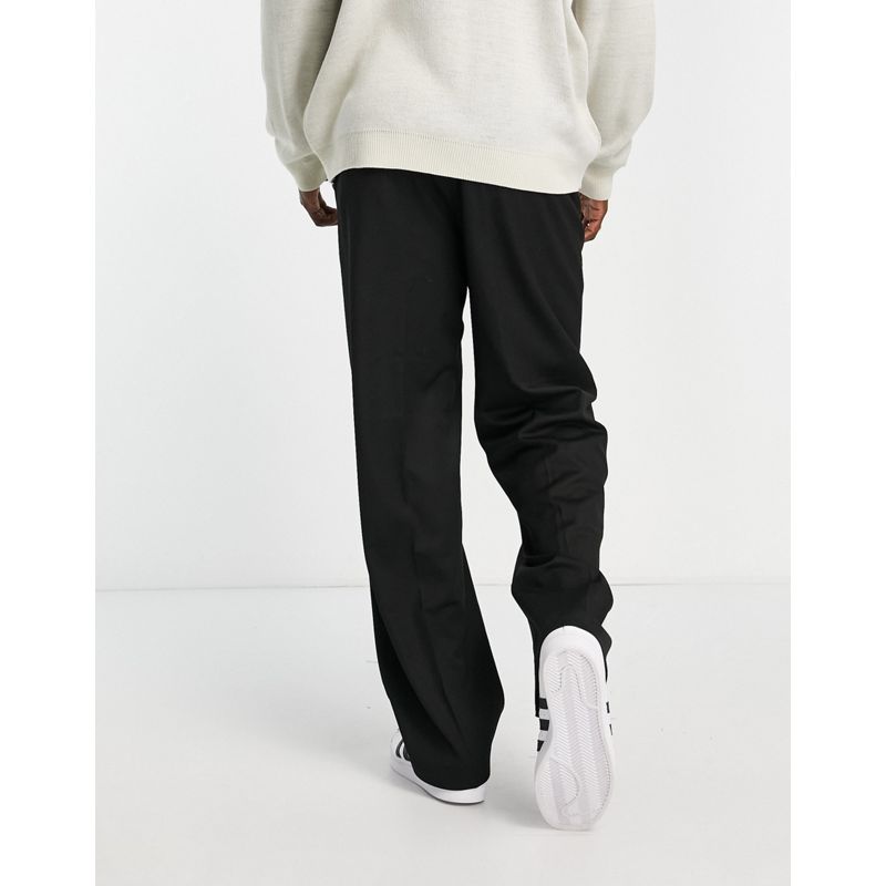 Pantaloni e chino Pantaloni eleganti DESIGN - Pantaloni eleganti con fondo ampio neri