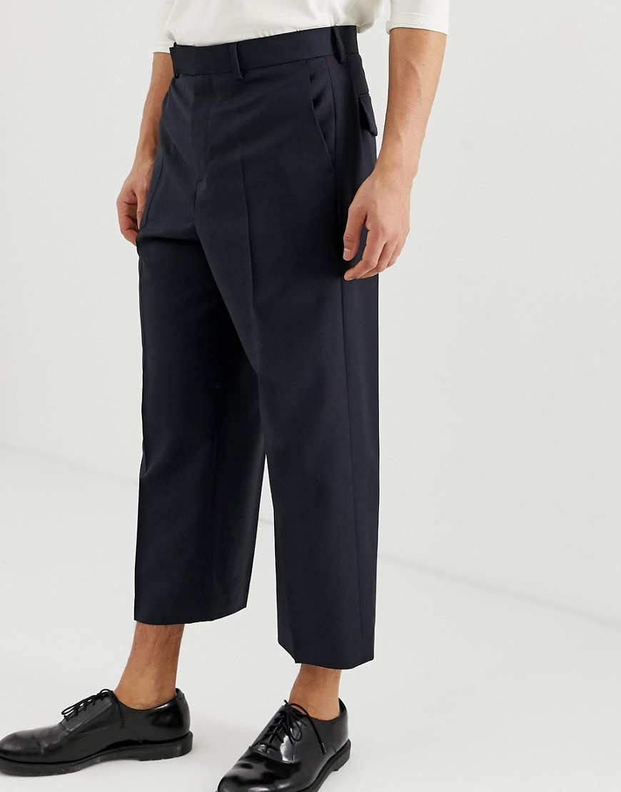 ASOS DESIGN - Pantaloni eleganti cropped con fondo ampio blu navy in 100% lana