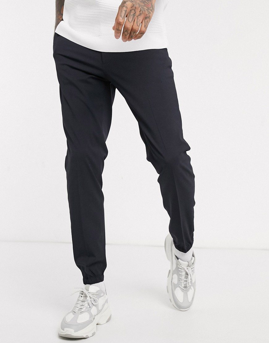 ASOS DESIGN - Pantaloni eleganti skinny con fondo stile joggers blu navy