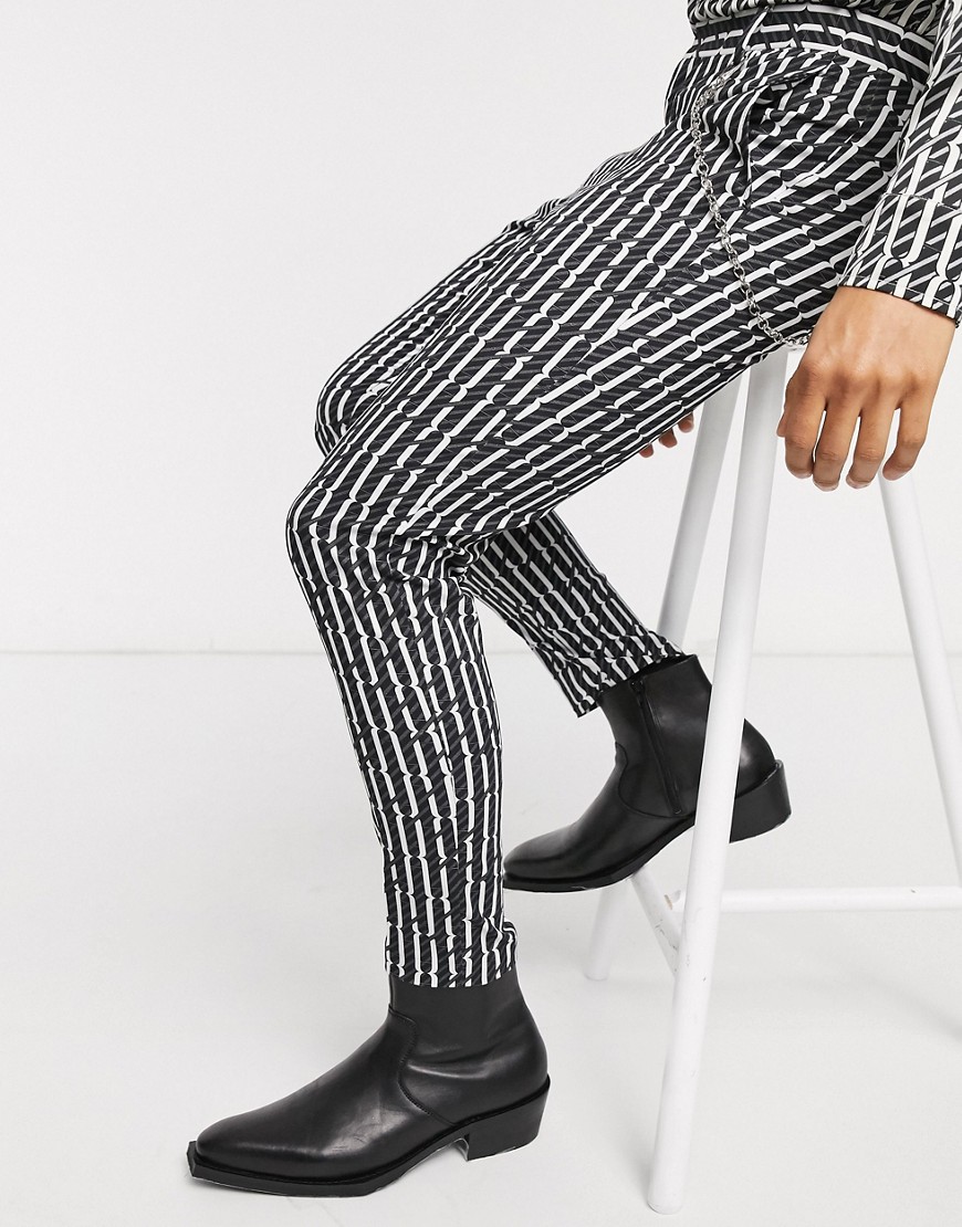 ASOS DESIGN - Pantaloni eleganti skinny in cotone neri con stampa geometrica e catene-Nero