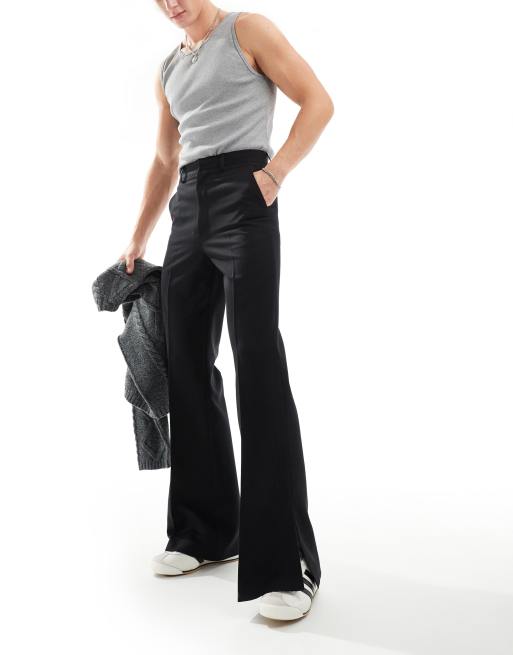 Pantaloni neri eleganti a zampa top