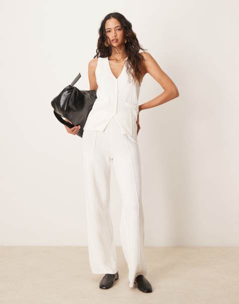 ASOS DESIGN - Pantaloni in maglia bianchi con fondo ampio in coordinato - view 1