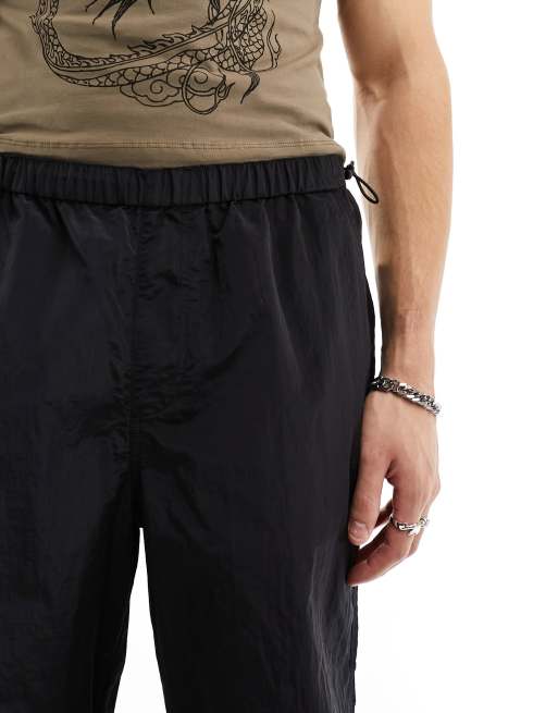 ASOS DESIGN - Pantaloni neri larghi in nylon, 4 di 5